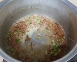 A picture of step 4 of Matar pulao.