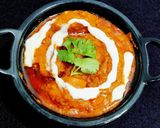 A picture of step 10 of Butter Chicken.