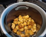 A picture of step 4 of Gammon steaks with garlic and cajun air fryer potatoes.