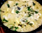 A picture of step 10 of Nawabi Paneer Restaurant style paneer in white gravy.