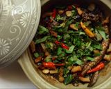 A picture of step 6 of Braised Goby Fish in Clay Pot with Vietnamese Coriander.