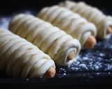 A picture of step 9 of Stuffed Sausage Bread Rolls.