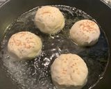 A picture of step 8 of Pan fried pork bun.