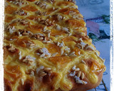 Foto del paso 8 de la receta: Coca de San Juan de Naranja confitada, crema pastelera y piñones