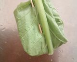 A picture of step 11 of Stuffed Mustard Leaves Parcels.