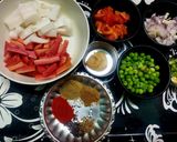A picture of step 1 of Gajar Mooli Matar Sabzi.