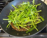 A picture of step 6 of Adobong Kangkong (water spinach).