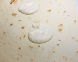 A picture of step 3 of Ham and Swiss Cheese Spicy Pinwheels.