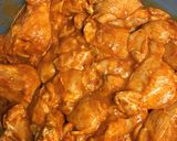 A picture of step 1 of Garlic fried rice with crispy chicken wings.