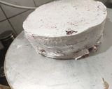 A picture of step 7 of Red velvet cake with cheese frosting.