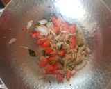 A picture of step 2 of Bread upma.