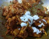 A picture of step 9 of Masala chicken.