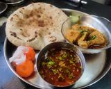 A picture of step 7 of Kolhapuri Chickan masala and curry.