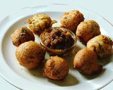 A picture of step 4 of Coconut Bonda.