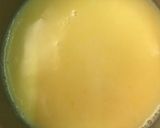 A picture of step 4 of Mango custard with gulab jamun.