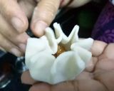 A picture of step 3 of Ukadiche Modaks.