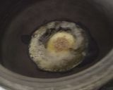 A picture of step 4 of Lasuni Dal Palak Khichdi.