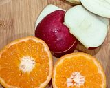 A picture of step 1 of Healthy Citrus Breakfast Porridge with Mosambi, Oats, Amaranth and mixed fruits.