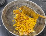 A picture of step 6 of Cheesy Crispy Corn.