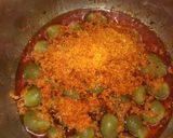 A picture of step 6 of Gum berry (gunda) and raw mango sabji.