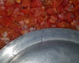 A picture of step 4 of Dam allu with colourful zeera rice.