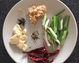 A picture of step 1 of Pork rice wine stew.