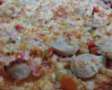 Foto del paso 3 de la receta Pizza casera Brackwurt con bacon y sofrito con curry
