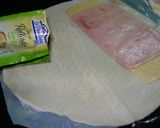 Foto del paso 3 de la receta: Palmeritas caseras con jamón y queso