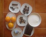 A picture of step 15 of Orange peels- dates and raisins chocolate candy.