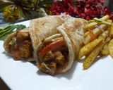 A picture of step 2 of Chicken tikka paratha roll.