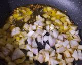 A picture of step 9 of Shaljam Gosht.
