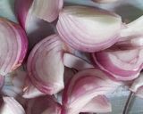 A picture of step 1 of Potato onion fry.