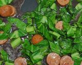 A picture of step 2 of Sauteed collard greens with sausage.