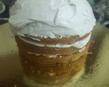 A picture of step 9 of White Forest Football cake.