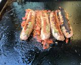 Une image de l'étape 8 de Saucisses de Toulouse grillées aux tomates,romarin et épices.