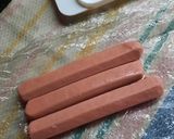 Foto del paso 1 de la receta: Salchichas con queso sobre arroz integral