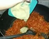 A picture of step 3 of Gajar ka halwa with milkmaid.