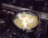 A picture of step 2 of Chicken schitty w/garlic mash + beans.