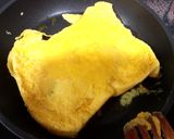 Foto del paso 2 de la receta Bocadillo de tortilla y aguacate