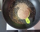 A picture of step 1 of Till dry fruit chikki.