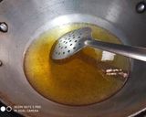 A picture of step 4 of Masala poori with white chana.