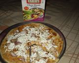 A picture of step 4 of Paneer Paratha pizza.