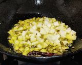 A picture of step 3 of Roti with brinjal aloo fry.
