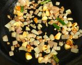 A picture of step 1 of Beans Bharta.