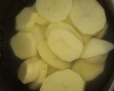 Foto del paso 5 de la receta: Pollo a la mostaza y al limón con papas