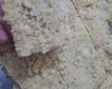 A picture of step 14 of Dry fruit suji tukri.