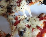 A picture of step 4 of Cheese and Mushroom Pizza.
