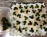 A picture of step 4 of Mickey Mouse Roll Sushi.