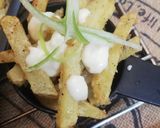 A picture of step 10 of Masala fries.