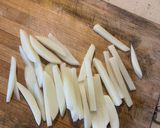 A picture of step 6 of Boiled egg sandwich with French fries.